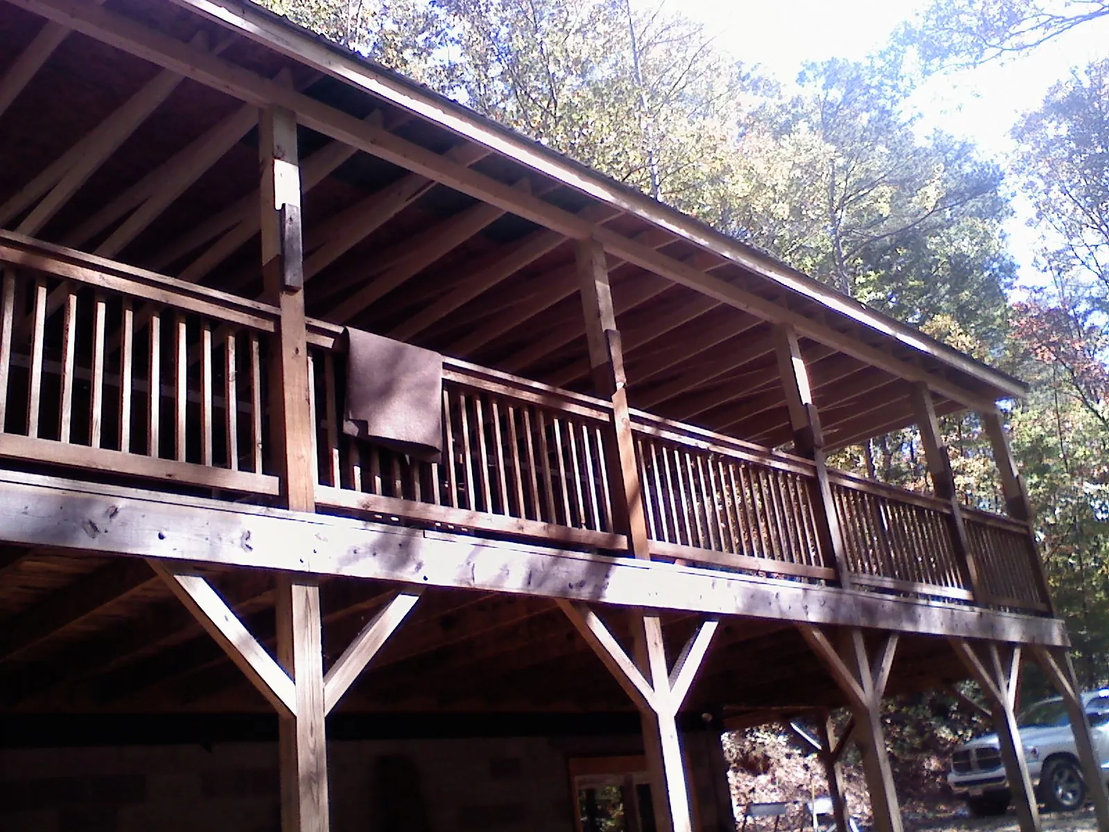 Timber framing under a new elevated porch and deck — Roof Leak Repair in Exira by Roofing Brothers
